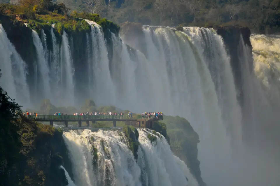 people looking at large waterfall — Foz do Iguaçu