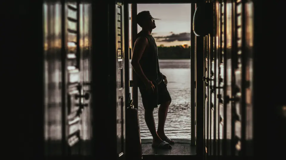 a person standing in a doorway — Manaus