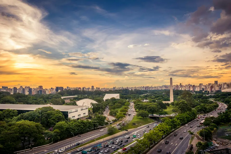 aerial photography of vehicles on road during golden hour — São Paulo
