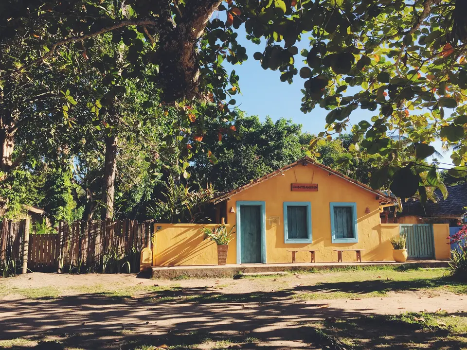 green and yellow cement house — Trancoso