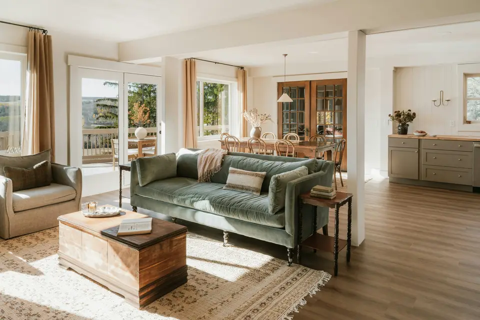 Cozy living room with plush sofa and wooden chest